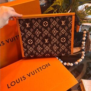 Louis Vuitton
Louis Vuitton Toiletry Blue Since 1854 Canvas Pouch